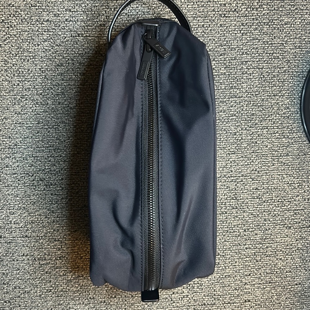 Away Travel Cosmetic Pouch in Black.